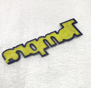 ORJİNAL ARKA BAGAJ (TEMPRA) YAZI 7703776