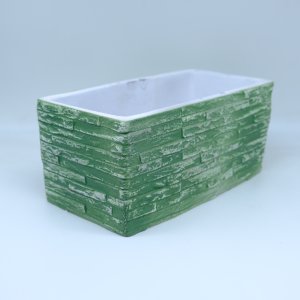 Duvar desenli yeşil aranjman beton saksı