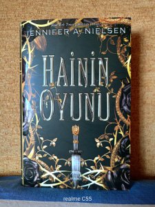 HAİNİN OYUNU.CİLTLİ ŞÖMİZLİ. ORJİNAL BANDROLLU.